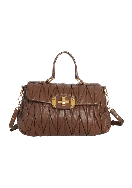 MATELASSÉ BAULETTO TOP HANDLE BAG